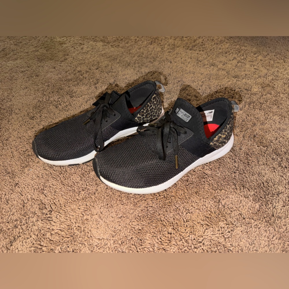 New Balance Black Knit Sneakers with Leopard Heel Accent